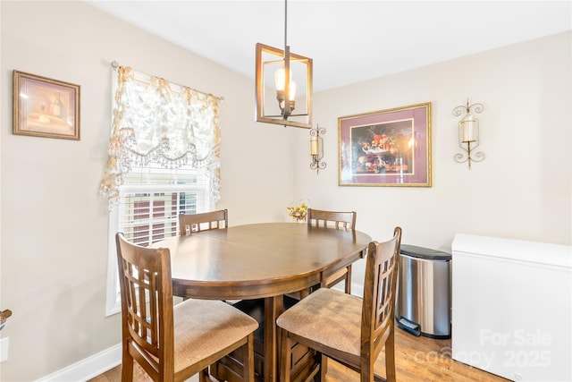 dining area with light wood-type flooring