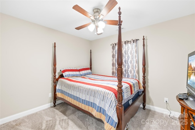 carpeted bedroom with visible vents, baseboards, and ceiling fan