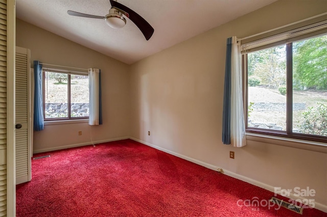 605 Hennessee St, Morganton, NC 28655 - unfurnished room featuring a ceiling fan, plenty of natural light, carpet floors, lofted ceiling, and baseboards