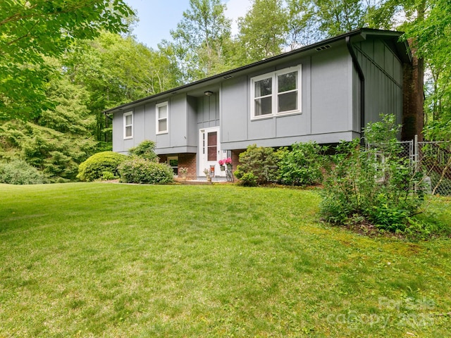 1 Laurel Forest Dr, Horse Shoe, NC 28742 - split foyer home with board and batten siding
