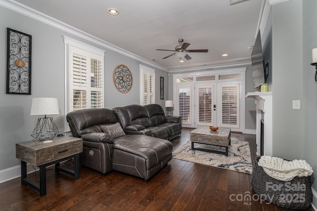 living room with ceiling fan, ornamental molding, dark wood-type flooring, and recessed lighting