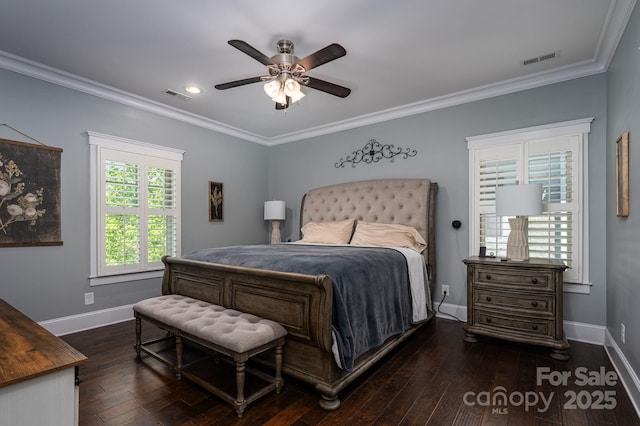 bedroom with baseboards, visible vents, and dark wood-style floors