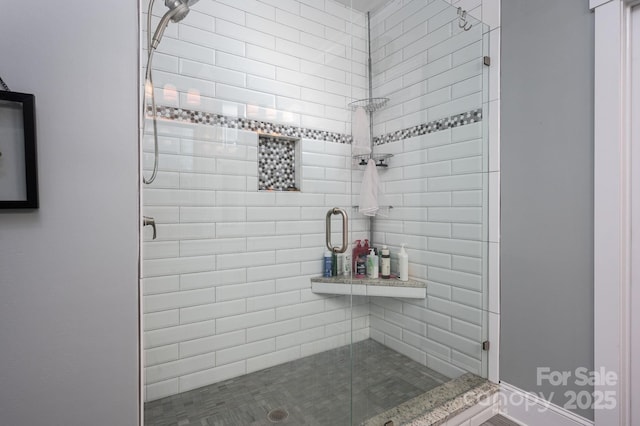 bathroom with a stall shower