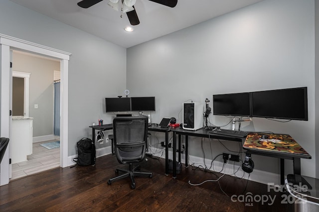 office area with baseboards, a ceiling fan, wood finished floors, and recessed lighting