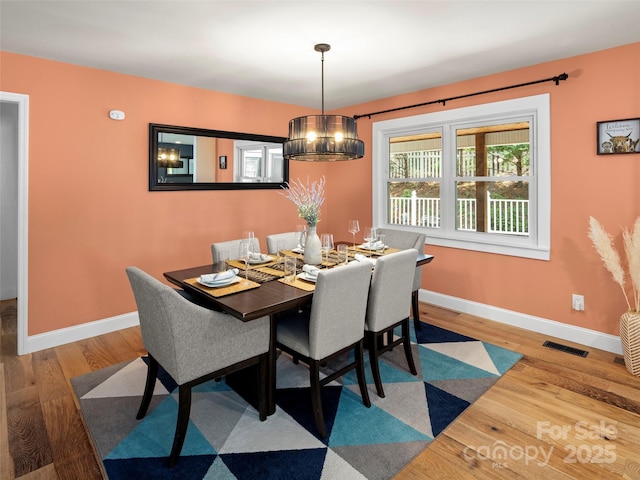 30 Gap Hill Dr, Fletcher, NC 28732 - dining area featuring a chandelier and wood finished floors