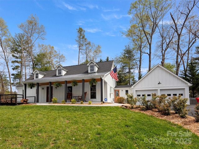 30 Gap Hill Dr, Fletcher, NC 28732 - view of front facade with board and batten siding, a porch, a front yard, and a garage