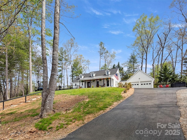 30 Gap Hill Dr, Fletcher, NC 28732 - view of front of house featuring a garage, covered porch, and an outdoor structure