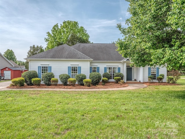 2603 Willis Dr, Harrisburg, NC 28075 - view of front of property with roof with shingles and a front yard
