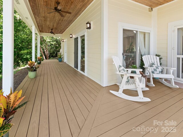 80 Ivy Cove Rd, Fairview, NC 28730 - wooden deck featuring a ceiling fan and covered porch