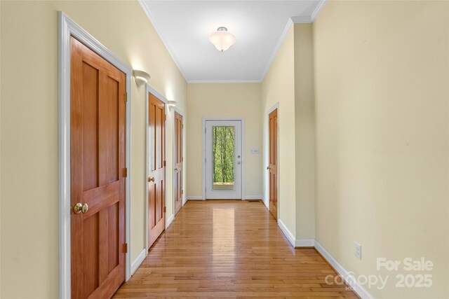 80 Ivy Cove Rd, Fairview, NC 28730 - hallway with baseboards, light wood-style floors, and ornamental molding
