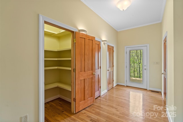 80 Ivy Cove Rd, Fairview, NC 28730 - interior space with light wood-style flooring, visible vents, crown molding, and baseboards