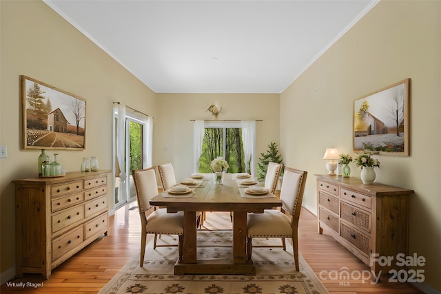 80 Ivy Cove Rd, Fairview, NC 28730 - dining area with light wood-style floors, baseboards, and ornamental molding