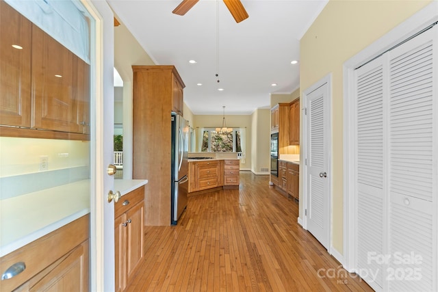 80 Ivy Cove Rd, Fairview, NC 28730 - hallway featuring light wood-style flooring, recessed lighting, a notable chandelier, and crown molding