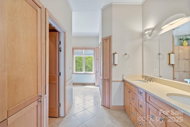 80 Ivy Cove Rd, Fairview, NC 28730 - bathroom with double vanity, tile patterned flooring, baseboards, and a sink