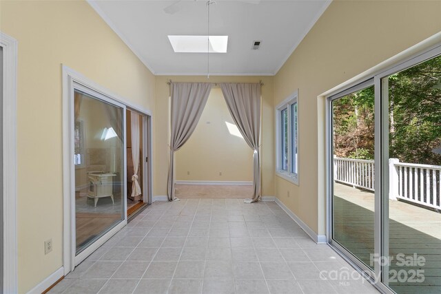 80 Ivy Cove Rd, Fairview, NC 28730 - empty room featuring a skylight, ornamental molding, and a healthy amount of sunlight