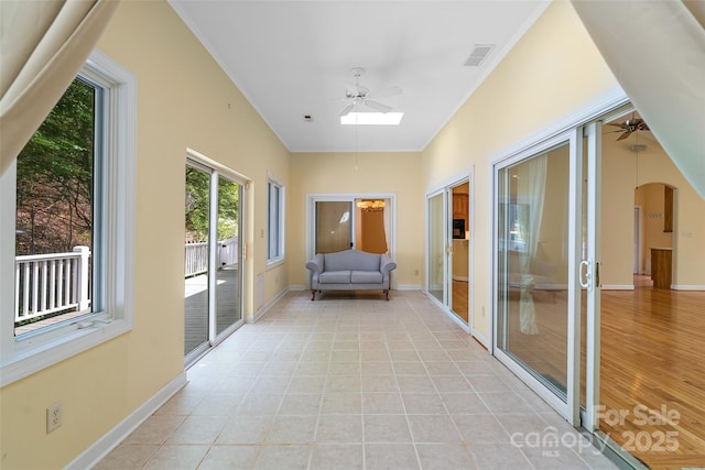 80 Ivy Cove Rd, Fairview, NC 28730 - sunroom featuring arched walkways, visible vents, a skylight, and baseboards