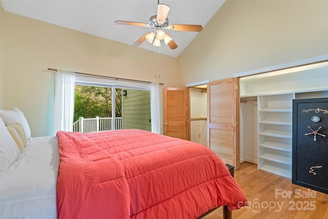 80 Ivy Cove Rd, Fairview, NC 28730 - bedroom featuring multiple closets, light wood-style floors, access to outside, high vaulted ceiling, and ceiling fan