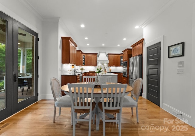 dining space with recessed lighting, baseboards, visible vents, and french doors
