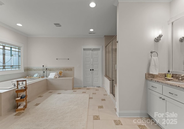 full bath featuring tile patterned floors, ornamental molding, a bath, and vanity