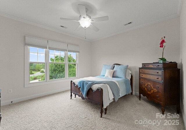 bedroom featuring baseboards, visible vents, ornamental molding, and light carpet