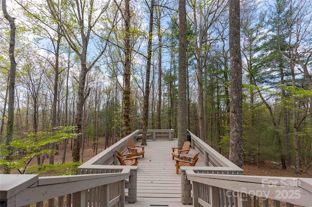 39 Tatham Rd, Hendersonville, NC 28792 - wooden terrace featuring a forest view