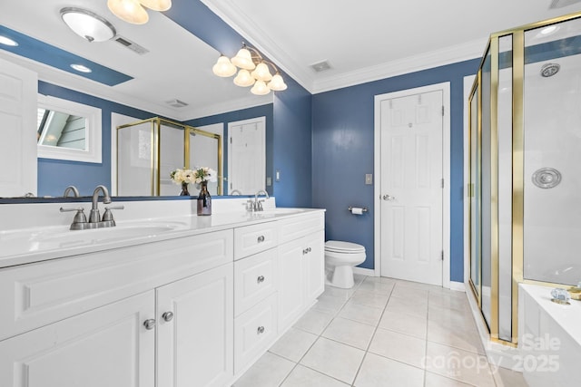 bathroom with visible vents, a stall shower, double vanity, and a sink