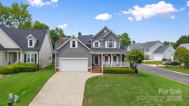 traditional home with a porch, a garage, a residential view, driveway, and a front yard