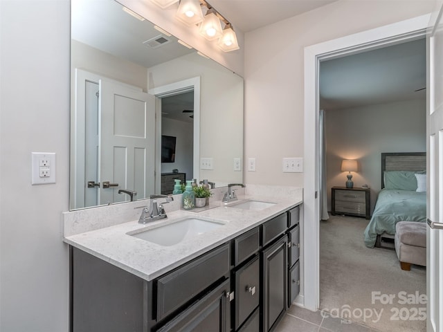 bathroom featuring ensuite bath, visible vents, a sink, and double vanity