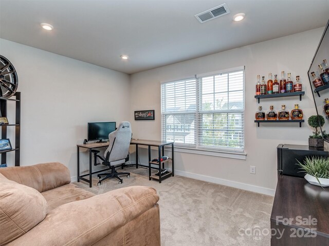 office with recessed lighting, visible vents, carpet flooring, and baseboards