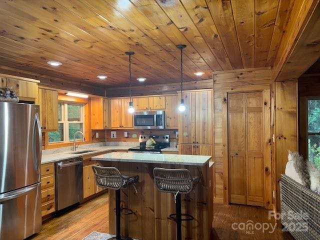 926 Cross Creek Dr, Rutherfordton, NC 28139 - kitchen with appliances with stainless steel finishes, wooden ceiling, a sink, light countertops, and light wood-style floors