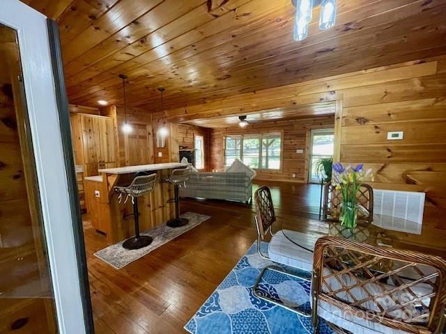 926 Cross Creek Dr, Rutherfordton, NC 28139 - dining space featuring wood walls, dark wood-style floors, and wood ceiling