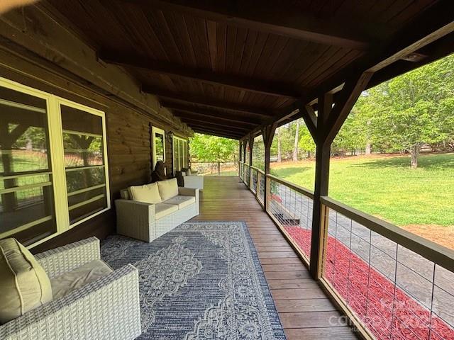 926 Cross Creek Dr, Rutherfordton, NC 28139 - wooden deck with a lawn and outdoor lounge area