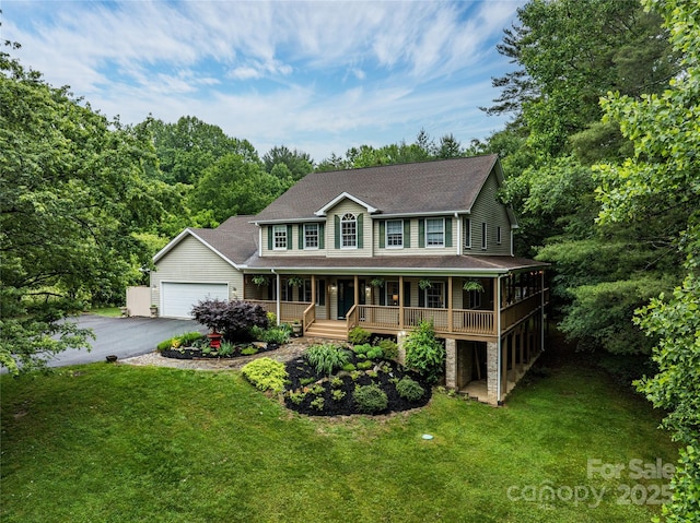 148 Broyles Rd, Hendersonville, NC 28791 - view of front of property with a porch, roof with shingles, a front yard, and asphalt driveway
