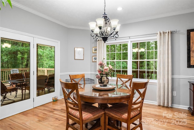 148 Broyles Rd, Hendersonville, NC 28791 - dining room featuring a chandelier, light wood-style floors, crown molding, and recessed lighting
