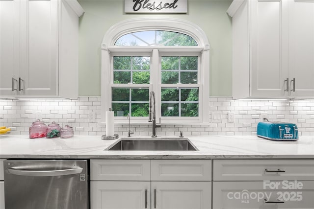 148 Broyles Rd, Hendersonville, NC 28791 - kitchen with stainless steel dishwasher, a sink, and white cabinets