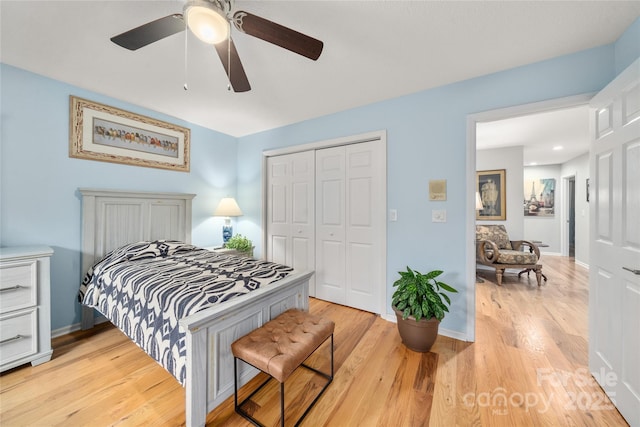 148 Broyles Rd, Hendersonville, NC 28791 - bedroom featuring a closet, light wood-style floors, baseboards, and a ceiling fan