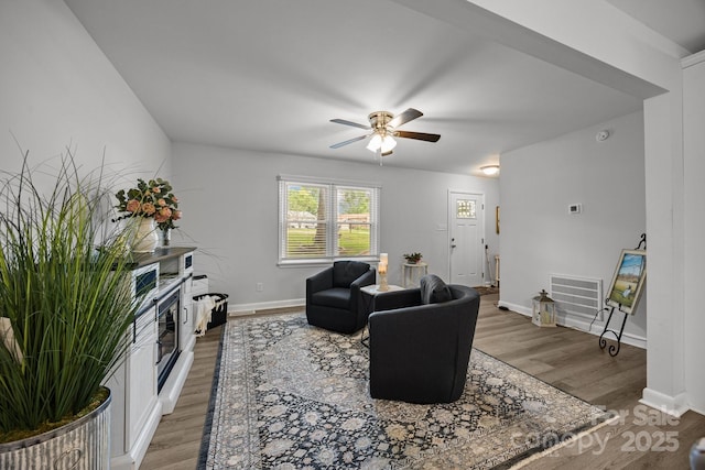 130 Cherokee Ln, Salisbury, NC 28147 - living room with ceiling fan, baseboards, and light wood finished floors