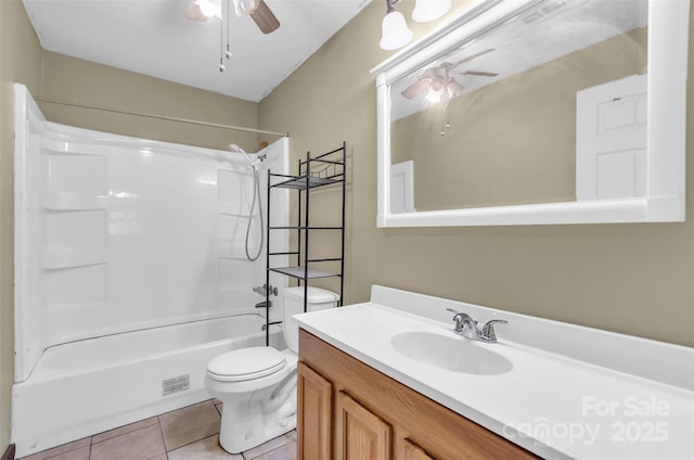 full bath with ceiling fan, shower / bathing tub combination, tile patterned floors, vanity, and toilet