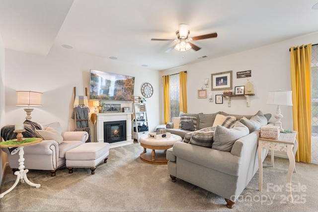 176 Jennymarie Rd, Mooresville, NC 28115 - living area with carpet, ceiling fan, and a glass covered fireplace