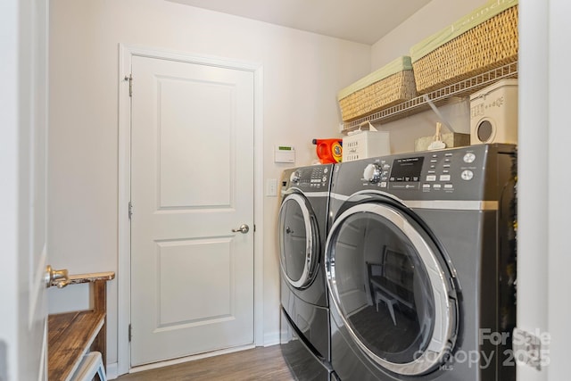 176 Jennymarie Rd, Mooresville, NC 28115 - laundry area featuring washing machine and clothes dryer and wood finished floors