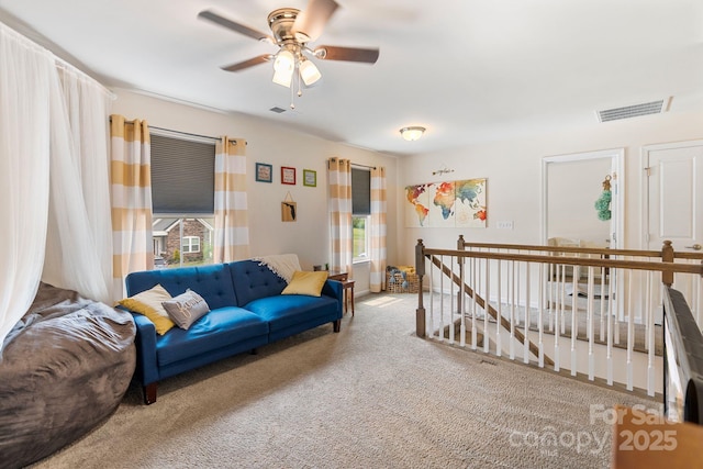 176 Jennymarie Rd, Mooresville, NC 28115 - living room featuring healthy amount of natural light, a ceiling fan, and carpet