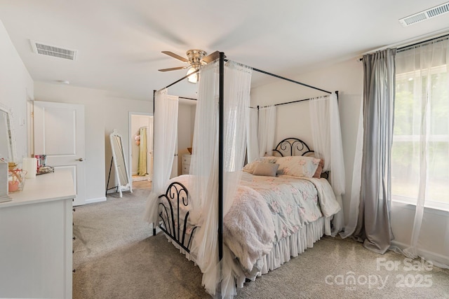 176 Jennymarie Rd, Mooresville, NC 28115 - bedroom featuring light carpet, multiple windows, ceiling fan, and baseboards