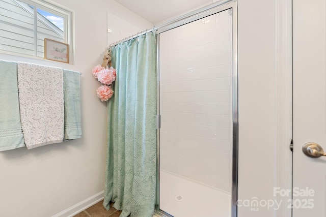 176 Jennymarie Rd, Mooresville, NC 28115 - bathroom featuring a stall shower and baseboards