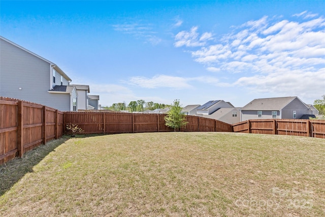 view of yard with a residential view