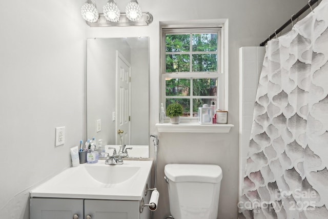 9200 Forest Green Dr, Charlotte, NC 28227 - bathroom with toilet, vanity, and curtained shower