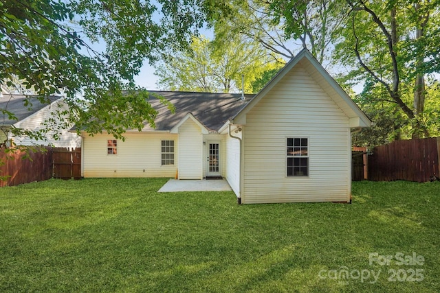 9200 Forest Green Dr, Charlotte, NC 28227 - back of property with a patio area, fence, a yard, and a shingled roof