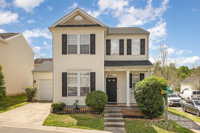 8424 Spirea Ct, Charlotte, NC 28215 - traditional-style house featuring a garage, covered porch, roof with shingles, and concrete driveway