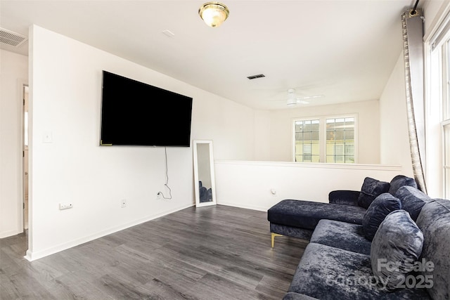 8424 Spirea Ct, Charlotte, NC 28215 - living area featuring visible vents, ceiling fan, and dark wood-type flooring