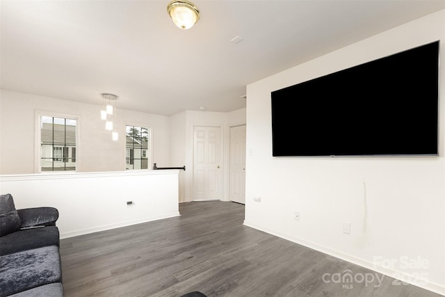 8424 Spirea Ct, Charlotte, NC 28215 - living area with baseboards and dark wood-type flooring