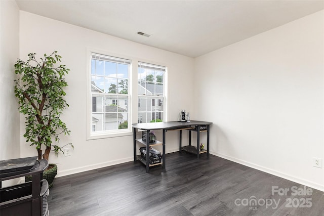 8424 Spirea Ct, Charlotte, NC 28215 - office area with dark wood-style floors, baseboards, and visible vents